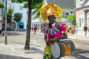 Vibrant street performer in traditional Junkanoo costume in Nassau, Bahamas.