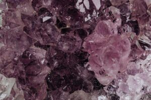 Detailed close-up of amethyst crystals showcasing their rich textures and deep colors.