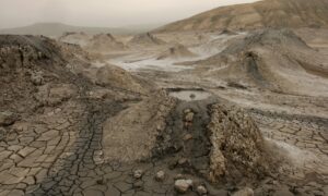 Explore the unique landscape of Qobustan's mud volcanoes in Azerbaijan.
