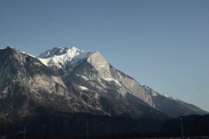 Beautiful view of snow-capped mountains in the Swiss Alps during winter.
